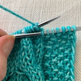 Knitted edge or first loop will do a lot