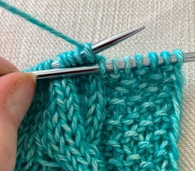 Knitted edge or first loop will do a lot